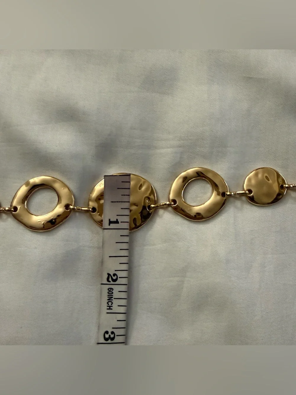 Gold tone disc chain belt